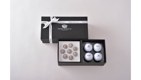 ピエール・マルコリーニが贈る2015年父の日ギフトは、人気の「トリュフ シャンパーニュ」と、マルコリーニのロゴ入りゴルフボールをアソートしたブラックのシックな装いの限定ギフトボックス。6月10日（水）～100セットの限定数量まで販売。