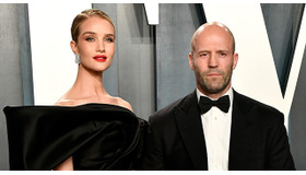 ロージー・ハンティントン＝ホワイトリー＆ジェイソン・ステイサム Photo by Frazer Harrison/Getty Images