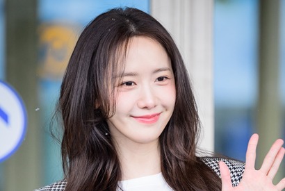 “さすがプロ” 少女時代・ユナが空港ファッションを披露！雪も降る美しい出国の様子【独占写真】 画像