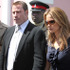 法廷に向かうトラヴォルタ夫妻 -(C) Splash/AFLO