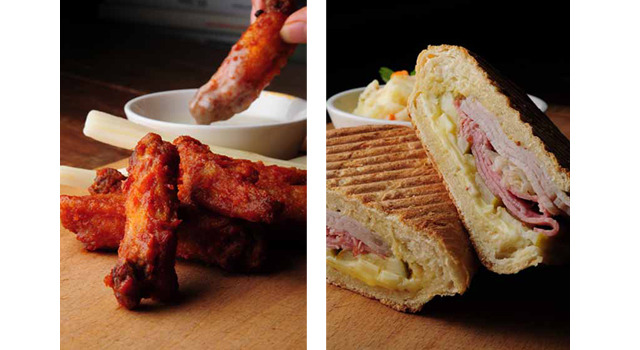 フードは、モダンなアメリカ料理を中心にラインナップ。左：バッファローチキンウィッグ 10ピース 右：サンドウィッチ